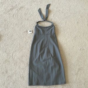 Cute form-fitting gray halter dress. Never worn.